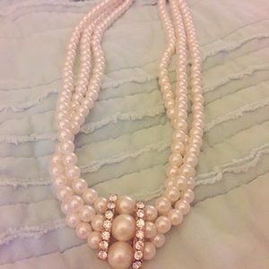 Pearl necklace with rhinestone accents bar